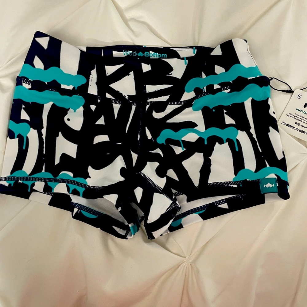 WodBottom booty shorts. New with tags. Size small. White/black/teal